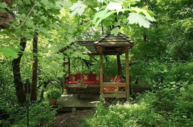 view of home's community with a wooden deck