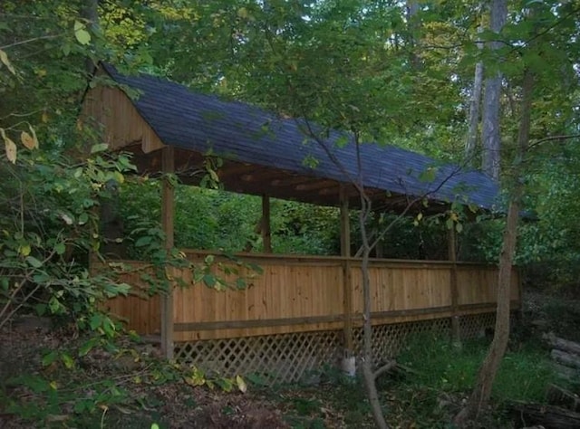 exterior space featuring a wooden deck