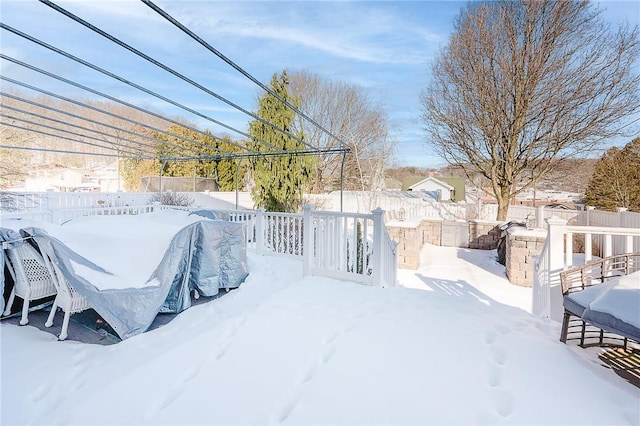 view of yard covered in snow