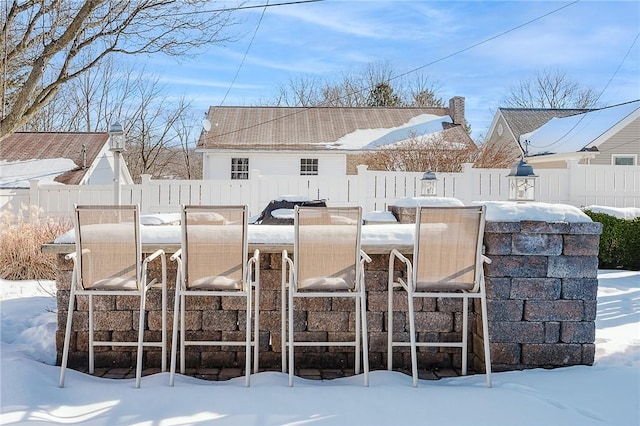 view of snow covered patio