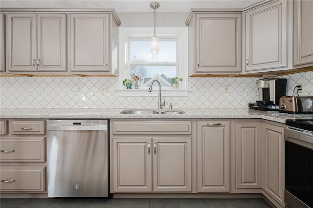 kitchen featuring sink, light stone counters, pendant lighting, stainless steel appliances, and decorative backsplash