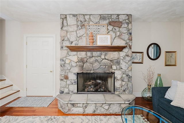 living room featuring hardwood / wood-style floors and a fireplace