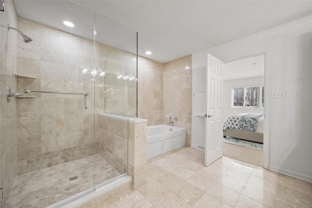 bathroom featuring plus walk in shower