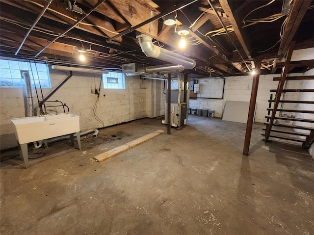 basement with sink and heating unit