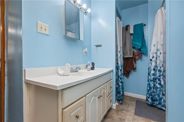 bathroom featuring vanity and tile patterned flooring