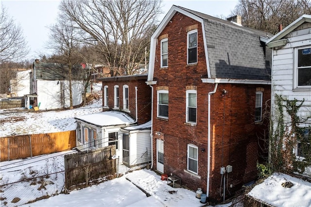 view of snow covered property