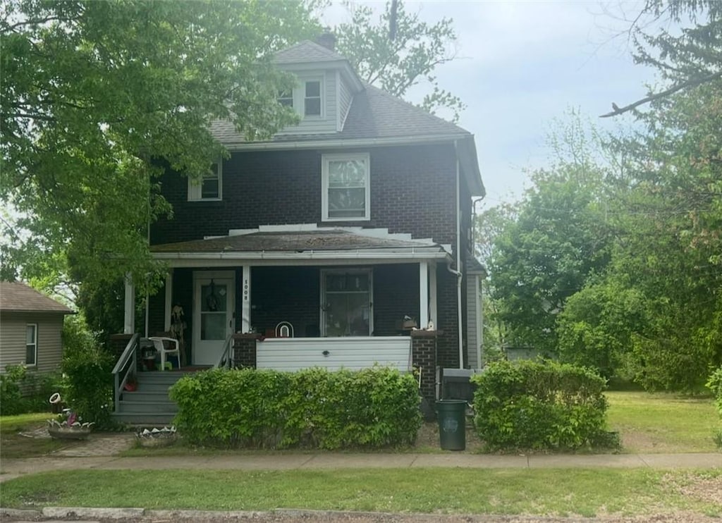 1008 Baldwin Ave, Sharon, PA 16146 - american foursquare style home featuring covered porch and brick siding