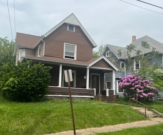273 Orchard St, Sharon, PA 16146 - view of front of property featuring covered porch, a front lawn, and roof with shingles