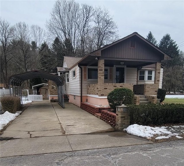 view of front of home featuring a carport