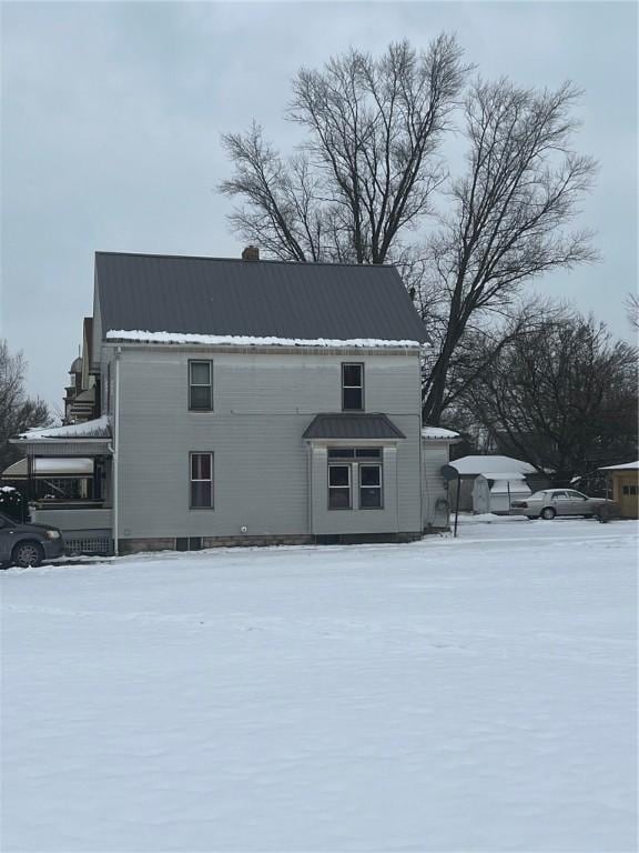 view of snow covered property