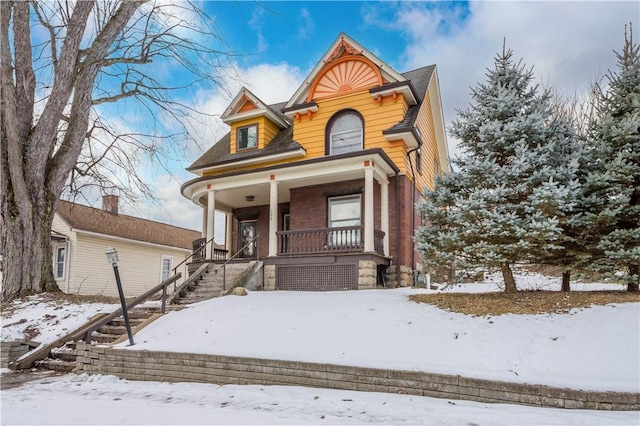 view of front of home featuring covered porch