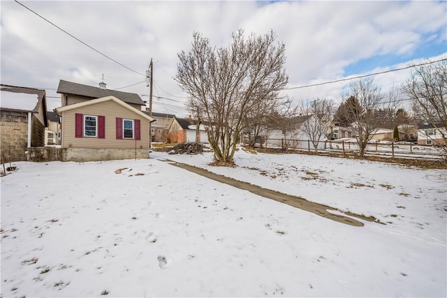 view of yard covered in snow