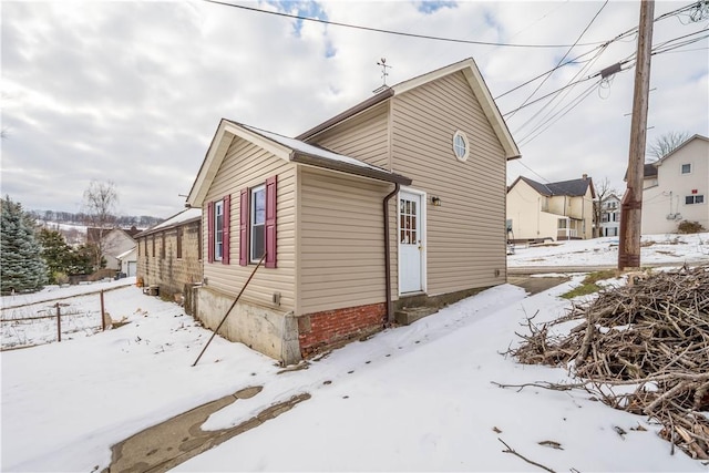 view of snow covered property