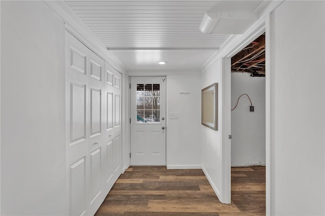 corridor with dark hardwood / wood-style floors