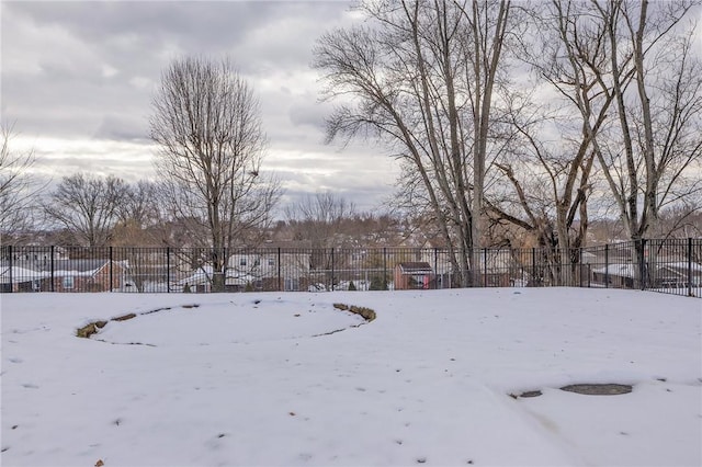 view of yard layered in snow