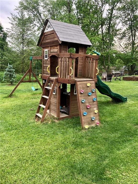 view of play area featuring a lawn