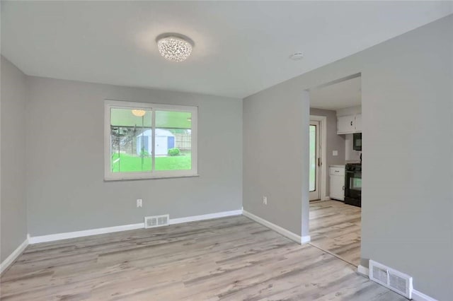 217 Belladonna Dr, Shaler, PA 15116 - unfurnished room with light wood-style flooring and baseboards