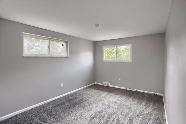 217 Belladonna Dr, Shaler, PA 15116 - spare room featuring dark carpet and a smoke detector
