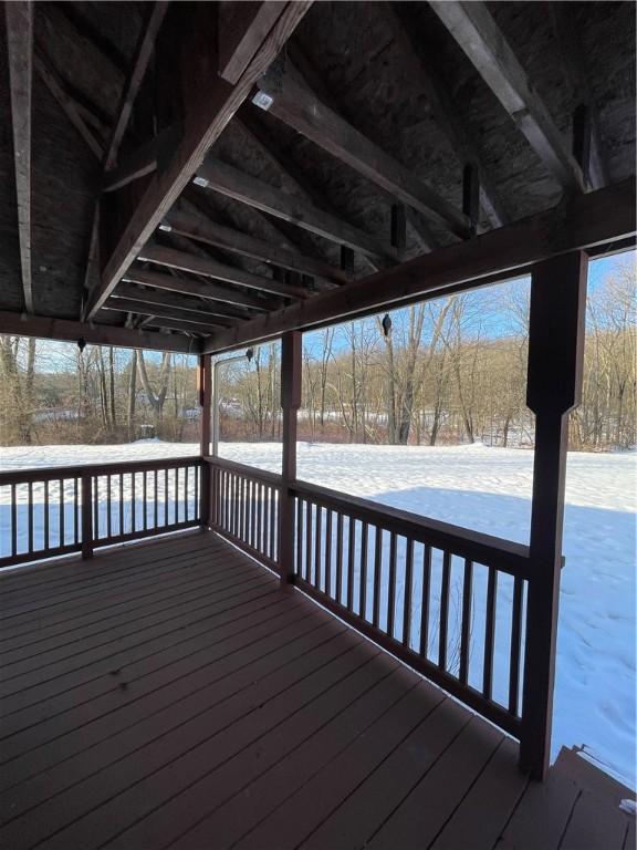 view of snow covered deck