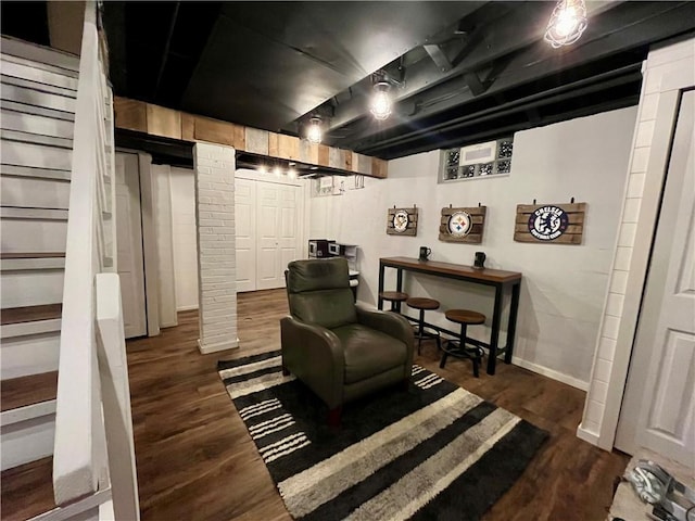 living area featuring dark hardwood / wood-style flooring