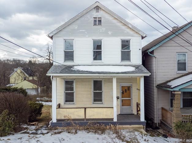 front of property featuring a porch