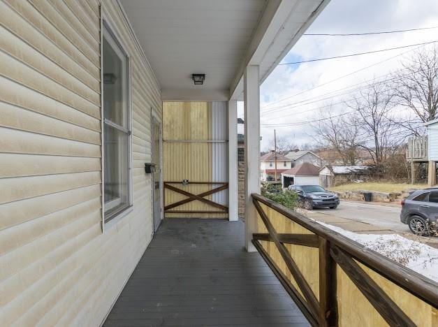 balcony featuring covered porch