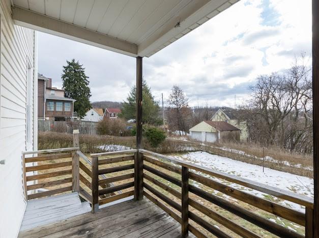 view of snow covered deck