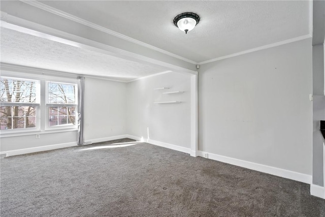 unfurnished room with ornamental molding, dark carpet, and a textured ceiling