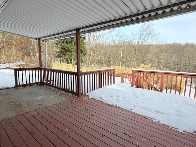 view of snow covered deck