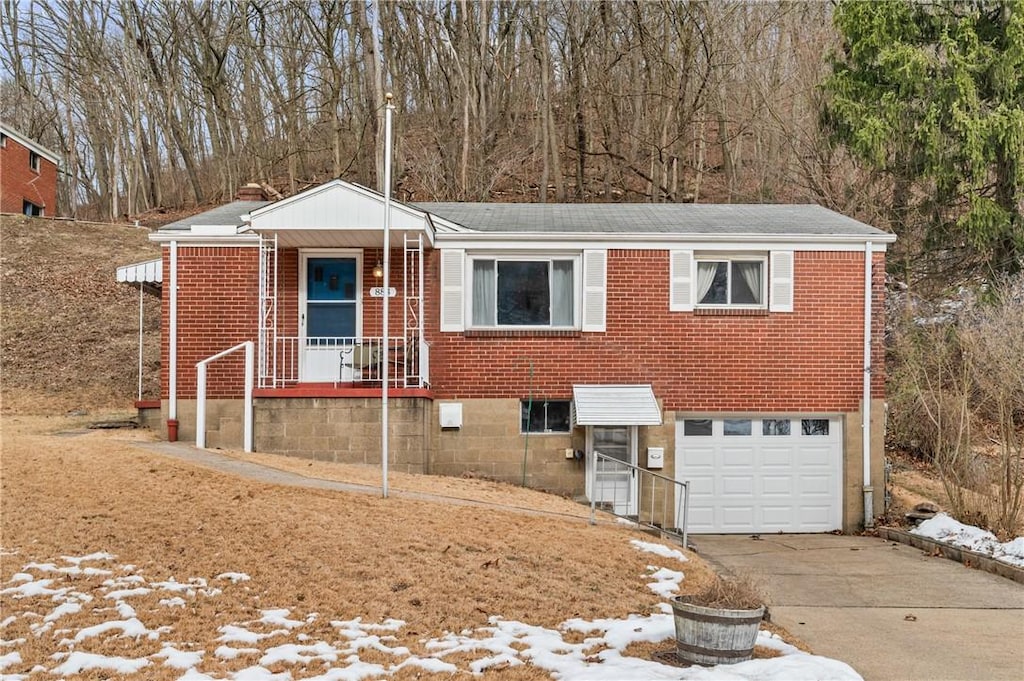 view of front of property with a garage