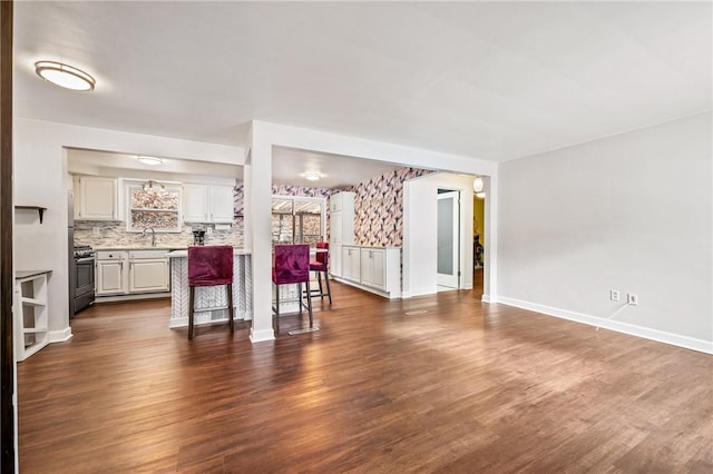 living room featuring dark hardwood / wood-style floors