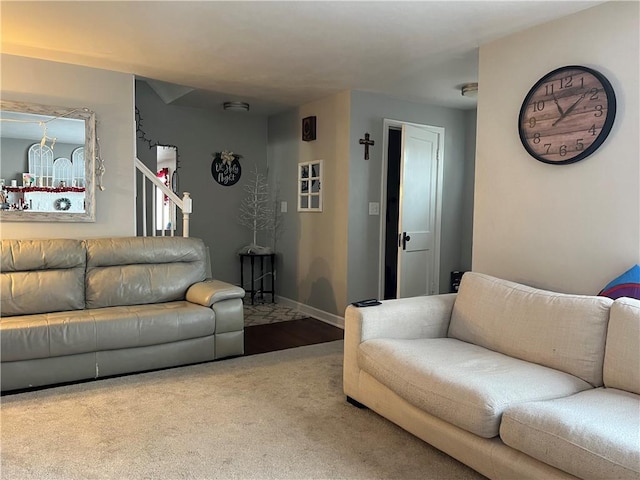 living room featuring light carpet