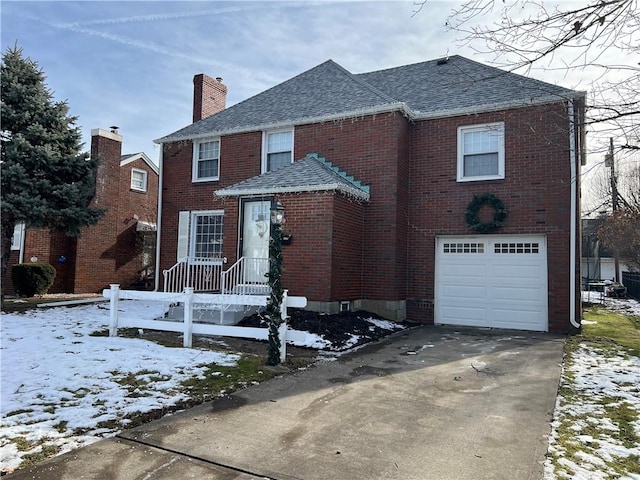 view of front of property with a garage