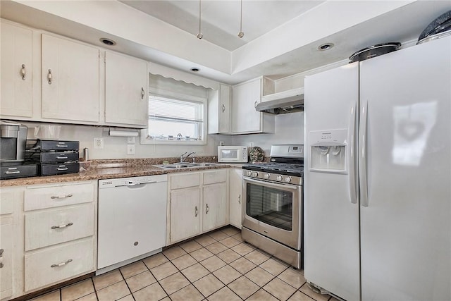 kitchen featuring white cabinetry, white appliances, sink, and light tile patterned floors