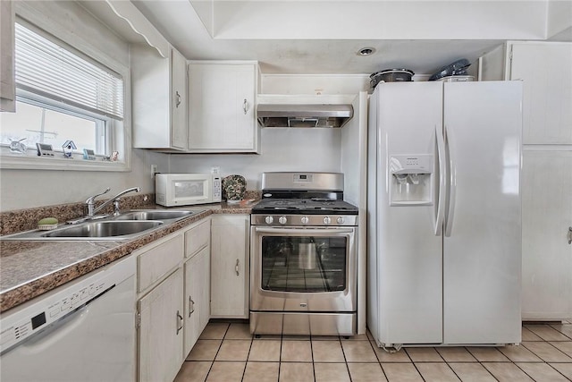 kitchen with sink, white appliances, ventilation hood, white cabinets, and light tile patterned flooring