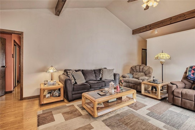 living room featuring ceiling fan, vaulted ceiling with beams, and light hardwood / wood-style floors