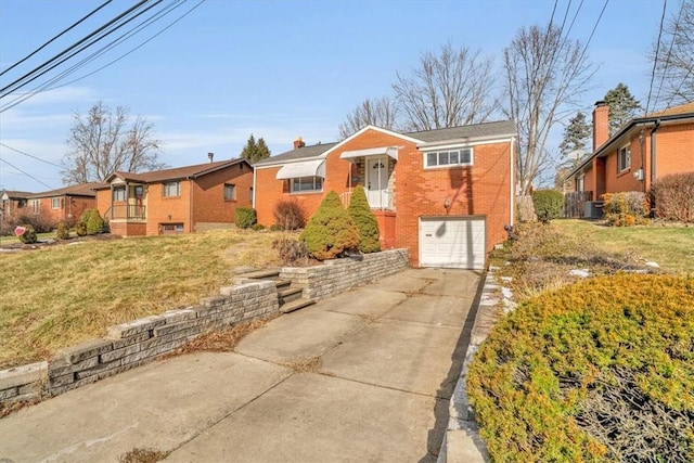 view of front of home featuring a garage, central AC, and a front yard