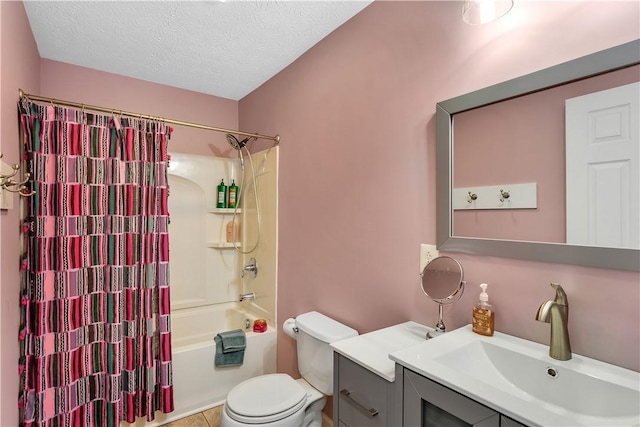 full bathroom with vanity, a textured ceiling, toilet, and shower / bath combo