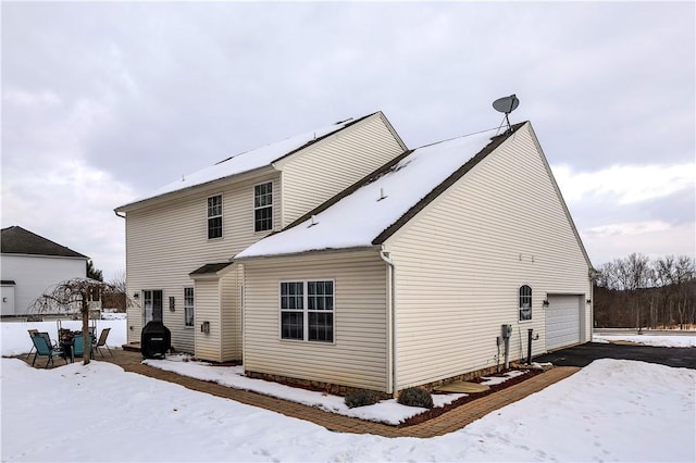 view of snow covered property