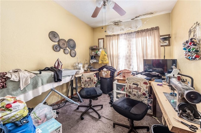 office area with ceiling fan and carpet flooring