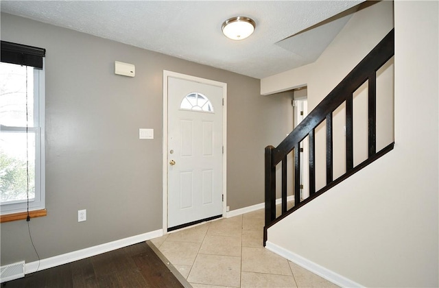 view of tiled foyer