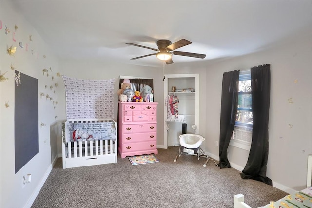 unfurnished bedroom featuring ceiling fan and carpet