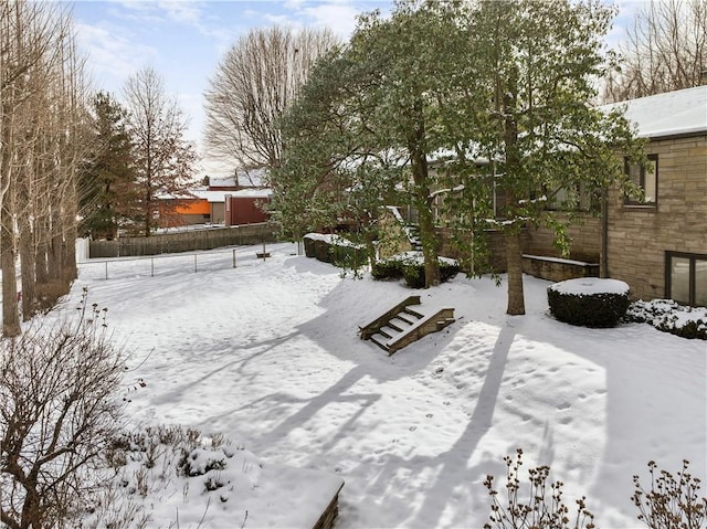 view of yard covered in snow