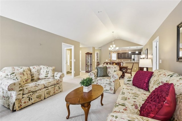 carpeted living room with vaulted ceiling and a chandelier