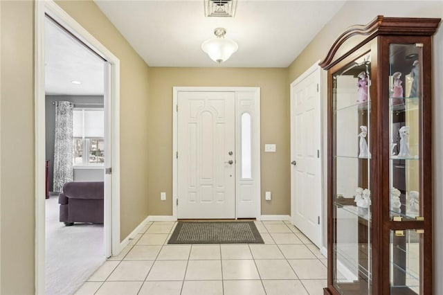 view of tiled foyer entrance