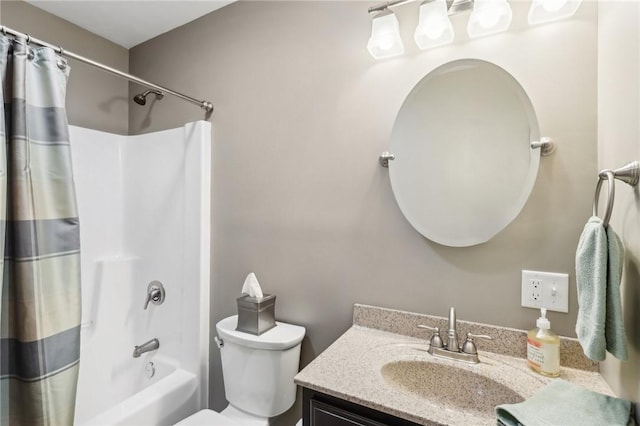 full bathroom featuring shower / tub combo with curtain, vanity, and toilet