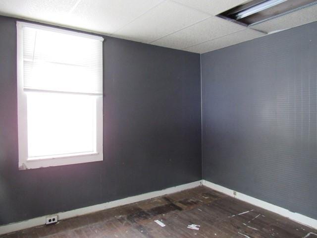 empty room with a drop ceiling