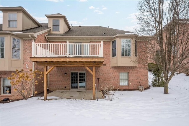 view of snow covered property