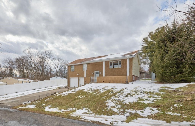 raised ranch with a garage