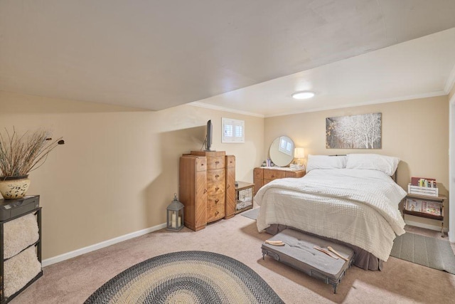 bedroom with light carpet and crown molding